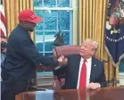  ?? SEBASTIAN SMITH/AFP VIA GETTY IMAGES ?? President Donald Trump and rapper Kanye West meet in 2018.