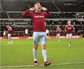  ?? (AFP) ?? West Ham United's Jarrod Bowen celebrates scoring against Derby County in their English FA Cup fourth-round match at Pride Park Stadium in Derby, central England on Monday