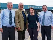  ??  ?? Above: Michael and Francis Clark, directors of Nolan Seafoods, Kate Forbes MSP and Jimmy Buchan, executive officer of the Scottish Seafood Associatio­n.