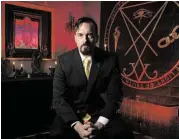  ?? Maria D. De Jesús / Houston Chronicle ?? Michael Ford is an author and co-president of the Greater Church of Lucifer, which is set to open Oct. 31 in Old Town Spring with a three-day celebratio­n.
