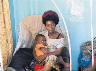  ?? JEROME DELAY/AP ?? Ado Ntanga and her son have been detained, unable to pay $850 for the boy’s sickle cell anemia treatment.