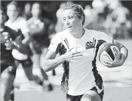  ?? BROCK UNIVERSITY ?? Brock's Taylour Hurd, with the ball, gains ground versus Toronto in women's rugby Saturday at Alumni Field in St. Catharines.