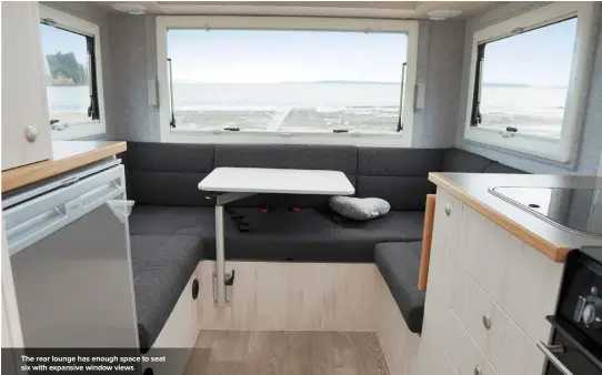  ??  ?? The rear lounge has enough space to seat six with expansive window views