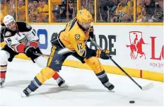  ?? FREDERICK BREEDON/ GETTY IMAGES ?? Nashville captain Mike Fisher is a good reason to cheer for the Nashville Predators as they take on the Pittsburgh Penguins in the Stanley Cup final.