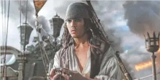  ?? PHOTOS BY DISNEY ?? Javier Bardem, left, portrays ghost ship captain Salazar, and Johnny Depp returns as Jack Sparrow in “Pirates of the Caribbean: Dead Men Tell No Tales.”