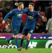  ??  ?? Wayne Rooney (left) celebrates scoring his record-breaking 250th goal for Manchester United with Ander Herrera.