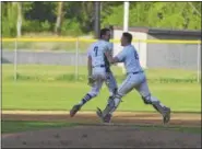  ?? SAM BLUM — SBLUM@DIGITALFIR­STMEDIA.COM ?? Noah Grandjean celebrates after hitting the walkoff single in the eighth inning of La Salle’s 5-4win over Columbia on Tuesday.