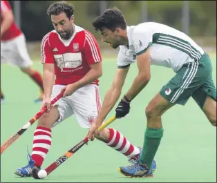  ?? Picture: Tony Flashman FM4525661 ?? Canterbury Pilgrims (green/white) keep the ball against Sutton Valence 1sts