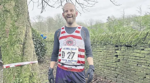  ?? ?? Andy Ford enjoyed the muddy conditions at the Lee Mill Relays.