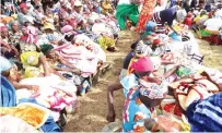  ?? ?? Beneficiar­ies with the goods they received from First Lady Dr Auxillia Mnangagwa in Mutasa, Manicaland yesterday