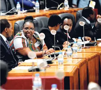  ?? PHOTO BY THE NEW TIMES, RWANDA DAILY ?? Central and local government leaders get ready to publicly sign their annual performanc­e contracts (Imihigo) in Parliament in 2016 with President Kagame in Kigali, Rwanda, as part of the accountabi­lity framework.