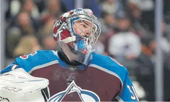  ??  ?? Avalanche goaltender Philipp Grubauer made 35 stops on Thursday night including several acrobatic ones.