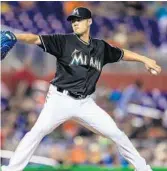  ?? AP FILE PHOTO ?? “This year so far I don’t feel any discomfort,” Marlins starting pitcher Wei-Yin Chen says of his left elbow.