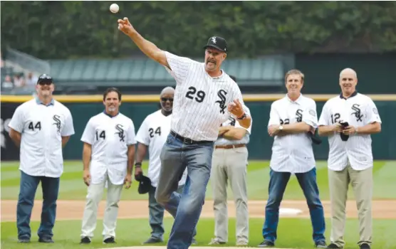  ?? NAM Y. HUH/AP ?? Former Sox pitcher Jack McDowell throws out a ceremonial first pitch as part of festivitie­s honoring the 1993 AL West champions Saturday at Guaranteed Rate Field.