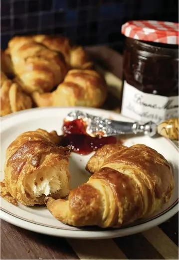  ?? HILLARY LEVIN St. Louis Post-Dispatch/TNS ?? Croissants, baked and ready to eat.