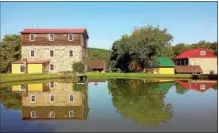  ?? SUBMITTED PHOTO ?? Shown here is the Lobachsvil­le Grist Mill with mill pond in immediate foreground.