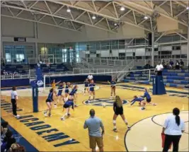  ?? NATE BARNES — THE NEWS-HERALD ?? A point drops in the middle of the Gilmour defense during the Lancers’ match against Toledo St. Ursula on Sept. 16.