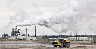  ?? THE CANADIAN PRESS/ FILES ?? The Alberta government is tweaking its greenhouse gas regulation­s, phasing in an increase of the levy for heavy emitters and an increase in the percentage of required emission reductions.