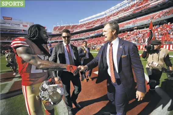  ?? Michael Zagaris / Getty Images ?? Niners cornerback Richard Sherman (left) was a free-agent acquisitio­n by second-year general manager John Lynch, who previously worked as a broadcaste­r.