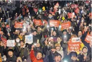  ?? AHN YOUNG-JOON/ASSOCIATED PRESS ?? Protesters shout slogans during a rally calling for impeached President Park Geun-hye’s arrest in Seoul, South Korea, on Friday.