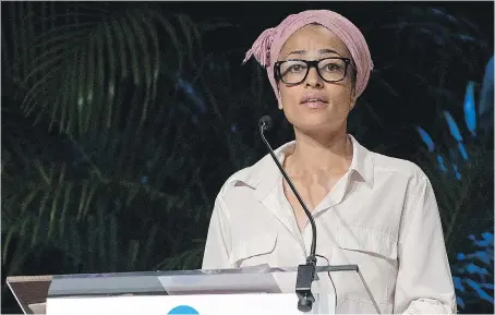  ?? D. DIPASUPIL/GETTY IMAGES/FILES ?? “I thought for a little bit that I was going to write about (West London’s deadly Grenfell Tower fire), but just couldn’t,” says author and London native Zadie Smith. “I think when you have so much rage, it’s very hard.”