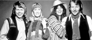 ??  ?? From left: Ulvaeus, Faltskog, Lyngstad and Andersson in a promotiona­l still from ‘ABBA: The Movie’.