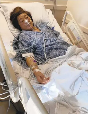  ??  ?? Anna Yuen, a translator working as a contractor for the Administra­tion for Children’s Services, suffered a ruptured spleen and colon in Brooklyn stabbing. She says ACS worker at scene escalated a tense situation.