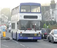  ??  ?? School buses arrive to pick up pupils from Brynteg Comprehens­ive School