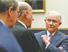  ?? THE ASSOCIATED PRESS ?? Judiciary Committee Chairman Bob Goodlatte of Virginia, left, and Rep. Louie Gohmert, R-Texas, center, talk with Attorney General Jeff Sessions, at the end of a House Judiciary Committee hearing Tuesday.