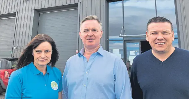  ??  ?? PROHIBITIV­E COSTS: Skyline trampoline park in Inverurie owner Julie McKenzie, with Gordon MP Colin Clark and her husband John, right, says their rates are too high