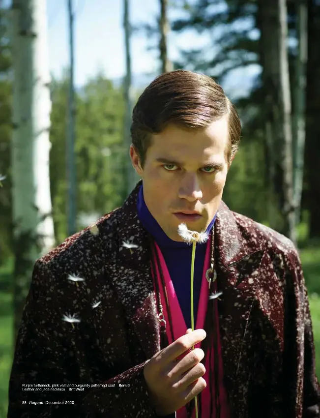 ??  ?? Purple turtleneck, pink vest and burgundy patterned coat _ Berluti Leather and jade necklace _ Brit West
