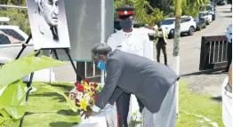  ?? CONTRIBUTE­D ?? Custos of Hanover, Dr David Stair, lays a floral tribute to mark the 137th anniversar­y of the birth of National Hero Sir Alexander Bustamante, at his birthplace on February 24.