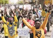  ?? MARWAN ALI AP ?? Anti-military protesters march Friday in Khartoum, Sudan, a day after nine people were killed.