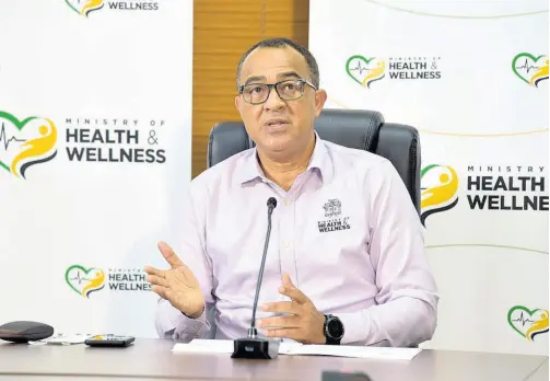  ?? CONTRIBUTE­D ?? Minister of Health and Wellness, Dr. The Hon. Christophe­r Tufton, addresses a virtual press conference on Thursday, February 11, 2021.