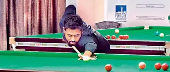  ??  ?? Mohammed Nazeeruddi­n plays a shot during his senior snooker pre-quarterfin­al match in the Telangana State Ranking Snooker & Billiards Championsh­ip at the Telangana Cue Sports Associatio­n in Hyderabad on Thursday.