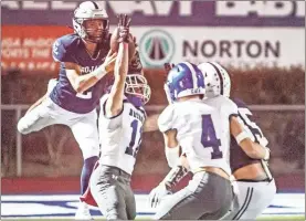  ?? Jan Wright ?? Nate Dunfee tries to make a spectacula­r catch in a game against Bremen this past season. Dunfee was named as the Region 6-3A Athlete of the Year last week.