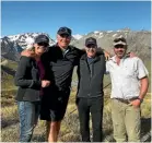  ??  ?? Enjoying the scenery of the southern alps are, from left, Devold executives Cathrine Stange, Craig Smith and Tor Jonsson, with a new Devold merino wool supplier, Will Murray of Glenmore Station, Lake Tekapo.