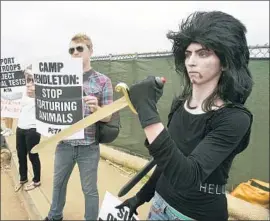  ?? Charlie Neuman San Diego Union-Tribune ?? NASIM AGHDAM, shown at Camp Pendleton in 2009, used YouTube to espouse veganism and exercise with videos that were at once surreal and unhinged.