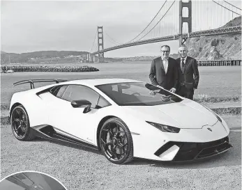  ?? PHOTOS BY LAMBORGHIN­I ?? CEO Stefano Domenicali, left, and head of research and developmen­t Maurizio Reggiani with the Huracan Performant­e.