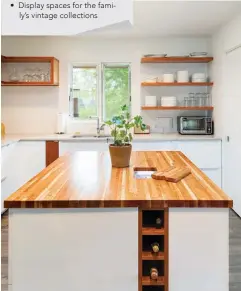  ??  ?? ( TOP) WITH THE SPACE NOW OPENED UP, THE BREAKFAST BAR AND MAHOGANY DETAILS ARE THE HOME’S NEW FOCAL POINT. THE BREAKFAST BAR WAS DESIGNED TO BE A HUB FOR THE HOME, A PLACE FOR MEALS, HOMEWORK, GAMES AND OTHER FAMILY ACTIVITIES.