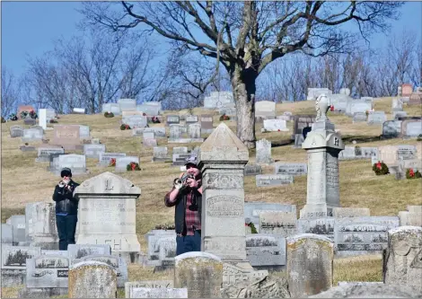  ?? JESI YOST — FOR MEDIANEWS GROUP ?? Members of the Boyertown Alumni Band play “Taps” at the Boyertown Area Historical Society’s memorial service at Fairview Cemetery on Jan. 15, rememberin­g the victims of the 1908 Rhoads Opera House fire.