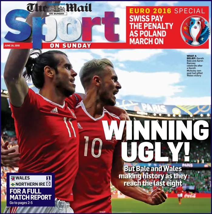  ??  ?? WHAT A
RELIEF: Gareth Bale and Aaron Ramsey celebrate after a Gareth McAuley own goal had gifted Wales victory