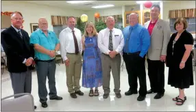  ?? Photo by Susan Holland ?? New officers of the Gravette Kiwanis Club were installed in a ceremony Sept. 25 at the Billy V. Hall Senior Activity and Wellness Center. Pictured following the ceremony are club directors Richard Page (left), Steve Huckriede and Zane Vanderpool; Dr....