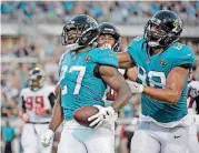  ?? [AP PHOTO] ?? Jacksonvil­le Jaguars running back Leonard Fournette (27) has missed the last four games because of a strained right hamstring.