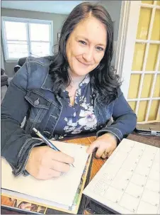  ?? ROSALIE MACEACHERN PHOTO ?? Holly Latter, a mother of three who has gone back to school in hopes of breaking a cycle of low-paying, part-time jobs, will be writing her valedictor­y address between job applicatio­ns.