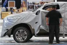  ?? Michael Ciaglo photos / Houston Chronicle ?? This Ram truck will be unveiled before the opening of the auto show, organized by the Houston Automobile Dealers Associatio­n.