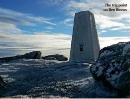  ??  ?? The trig point on Ben Rinnes