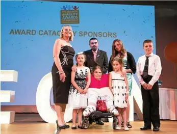  ?? PHOTO: MIRAPOSA IMAGES ?? GREAT COMMUNITY: Deanna Brady (centre) was the winner of the Elissa Flanagan Scholarshi­p at the Toowoomba Business disABILITY Awards.