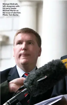  ??  ?? Michael McGrath, left, disagrees with his party leader Micheál Martin on the issue of abortion. Photo: Tom Burke