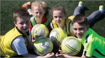  ??  ?? Having some fun at the Park FC Summer Camp at Christy Leahy Park, Tralee recently were, from left: Adam Griffin, Danny Gazi, Katie Williams and Ryan Hand
